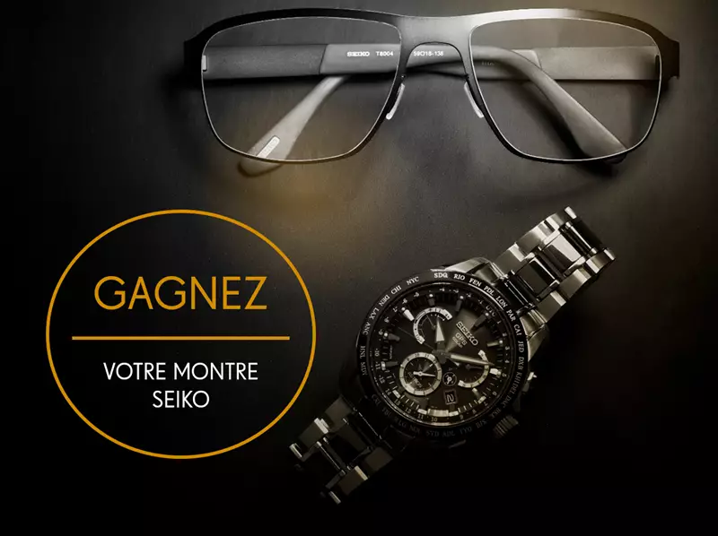 Win a watch image of eyeglasses and a watch sitting on a table